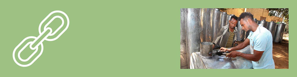 Youth artisans (SMEs) fabricating metal silos in Debub Achefer, Amhara Region, Ethiopia