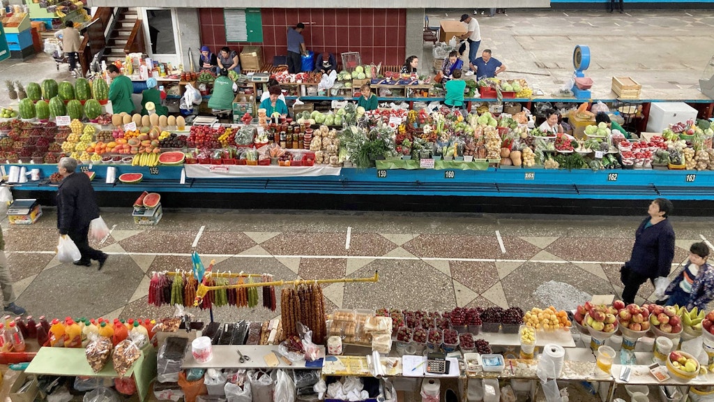 Shoppers at a food market in Almaty, Kazakhstan
