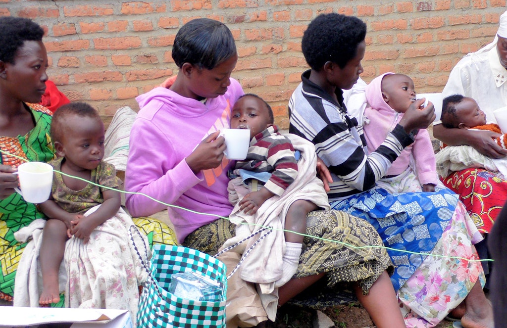 Children feeding in Rwanda
